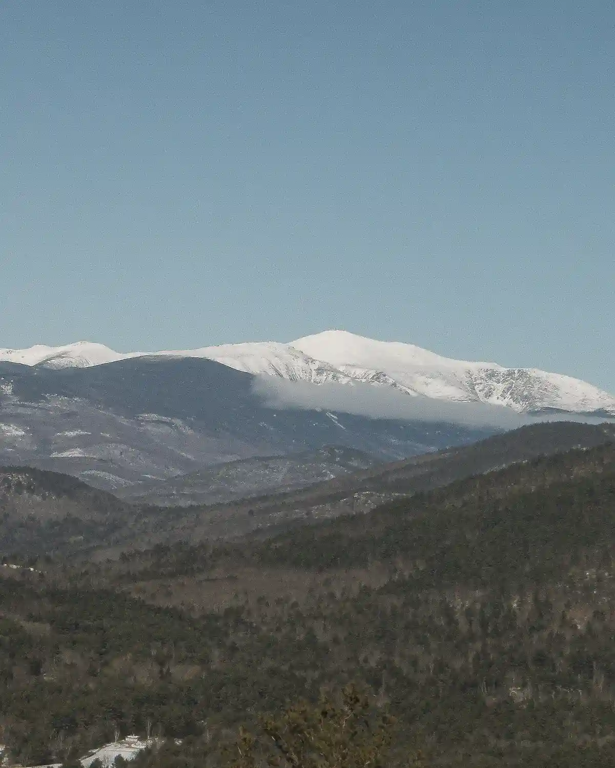 Featured image for how to practice silence with a winter landscape of a mountain range covered in snow