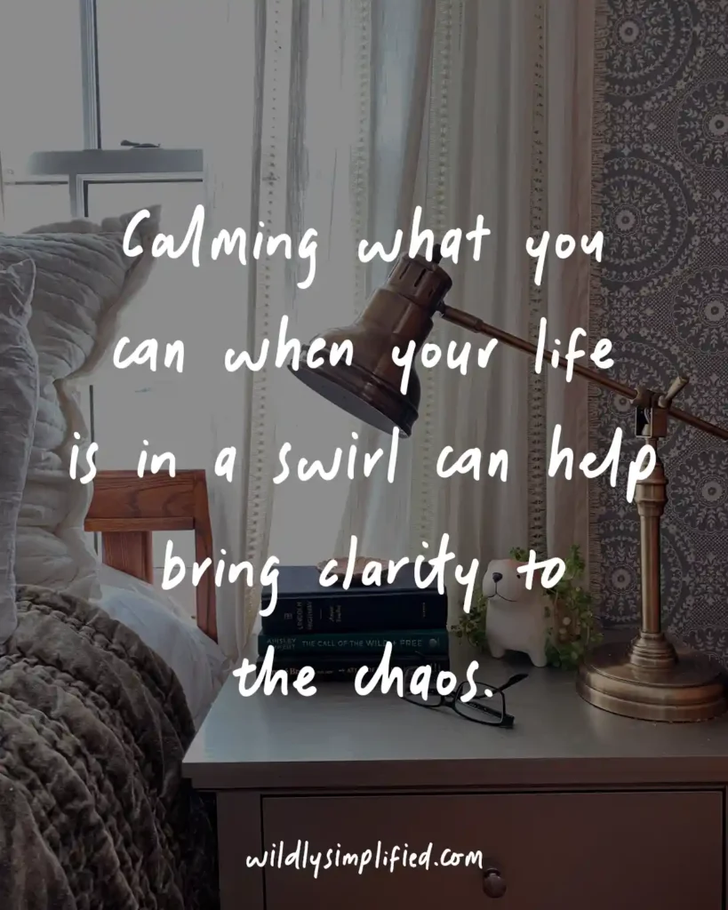 "Calming what you can when your life is in a swirl can help bring clarity to the chaos." text on a dark background image of a nightstand with items on it