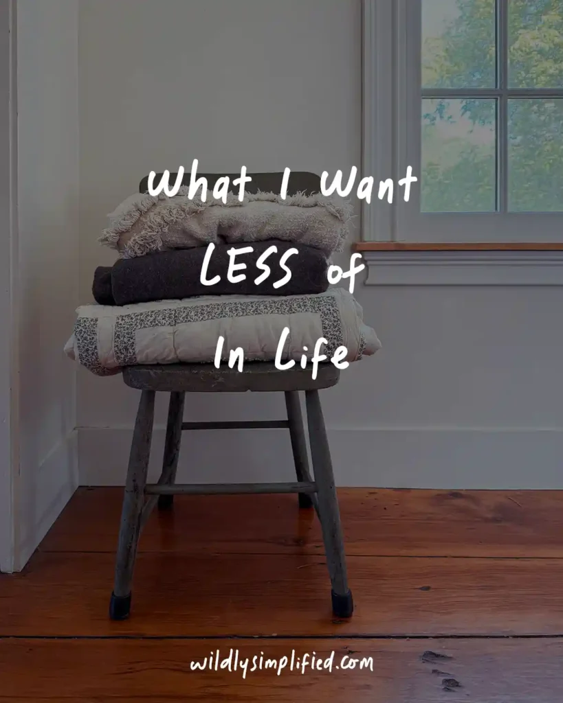 "What I want less of in life" text on an image of a wooden chair filled with blankets